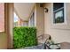 Private balcony with seating and privacy screen at 2200 S University Blvd # 201, Denver, CO 80210