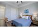 Bright bedroom featuring a comfortable bed and wood floors at 2200 S University Blvd # 201, Denver, CO 80210