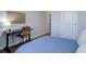 Cozy bedroom with a comfortable bed and built-in workspace at 2200 S University Blvd # 201, Denver, CO 80210