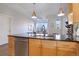 Modern kitchen with stainless steel appliances and island at 2200 S University Blvd # 201, Denver, CO 80210