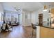 Living room with hardwood floors and access to balcony at 2200 S University Blvd # 201, Denver, CO 80210