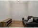 Spacious living room with a comfortable couch and wood floors at 2200 S University Blvd # 201, Denver, CO 80210
