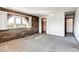 Bedroom with a beautiful brick accent wall and a half-moon window at 1751 E 138Th Ave, Brighton, CO 80602