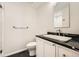 Bathroom with black marble countertop and floors at 2105 Keota Ln, Superior, CO 80027
