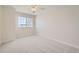 A simple, minimalist bedroom design with a neutral color palette and ample space at 2105 Keota Ln, Superior, CO 80027