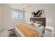 Inviting bedroom with warm tones, a cozy bed, and bedside tables, creating a relaxing space at 2105 Keota Ln, Superior, CO 80027