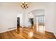 Dining room with hardwood floors and a view of the staircase and front entrance at 2105 Keota Ln, Superior, CO 80027