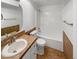 Traditional bathroom with tiled floors and a shower over tub combination at 7292 Firethorn, Littleton, CO 80125
