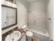 Bathroom featuring vanity and bath with shower combo at 7292 Firethorn, Littleton, CO 80125