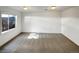 A bright bedroom features neutral carpet and a window with natural light at 7292 Firethorn, Littleton, CO 80125