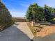 Suburban home showcasing a long driveway and mature landscaping at 7292 Firethorn, Littleton, CO 80125