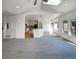 Bright, open living space connecting to a modern kitchen with an eat-in bar at 7292 Firethorn, Littleton, CO 80125