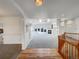 Bright, open living room featuring a fireplace and large windows with scenic views at 7292 Firethorn, Littleton, CO 80125