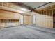 Spacious unfinished basement with concrete floor, painted walls, and ample storage space at 10001 E Evans Ave # 58B, Aurora, CO 80247