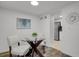Cozy dining area with seating for two, bright light and backyard views at 10001 E Evans Ave # 58B, Aurora, CO 80247