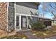 Charming front entrance featuring neutral siding and a well-manicured lawn and walkway at 10001 E Evans Ave # 58B, Aurora, CO 80247