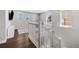 Spacious landing at the top of the stairs with lots of natural light at 1632 Saddlesmith Pl, Castle Pines, CO 80108