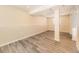 This basement features a large open area with vinyl floors at 3027 S Jasper Way, Aurora, CO 80013