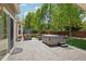 Well-maintained backyard with a hot tub, seating area, and lush landscaping perfect for relaxation at 5046 Sage Brush Dr, Broomfield, CO 80023