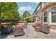 Inviting backyard with a fire pit, seating area, and hot tub perfect for outdoor relaxation and entertainment at 5046 Sage Brush Dr, Broomfield, CO 80023