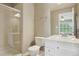 Bathroom featuring a glass-door shower and a white vanity at 5046 Sage Brush Dr, Broomfield, CO 80023