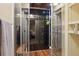 Spacious walk-in closet with wood floors, recessed lighting, and custom shelving at 5046 Sage Brush Dr, Broomfield, CO 80023