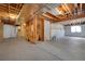 Unfinished basement featuring concrete floors, exposed ductwork, and framing, ready for customization at 11268 Grove St # I, Westminster, CO 80031