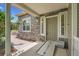 Charming front entrance with stone accents, a covered porch, and accessible ramp at 11268 Grove St # I, Westminster, CO 80031
