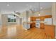 Bright kitchen with light wood cabinets, modern appliances, and hardwood floors at 11268 Grove St # I, Westminster, CO 80031