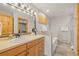 Bright bathroom featuring a tub, tiled shower, and wooden cabinets at 100 River Park Dr # A, Breckenridge, CO 80424