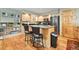 Bright kitchen featuring a central island with bar stool seating and modern stainless steel appliances at 100 River Park Dr # A, Breckenridge, CO 80424