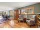 Open-concept living and dining area featuring beautiful hardwood floors and lots of natural light at 100 River Park Dr # A, Breckenridge, CO 80424