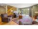 Living room with a staircase, leather furnishings, hardwood floors, and a walk-out patio at 100 River Park Dr # A, Breckenridge, CO 80424