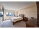 Main bedroom with large window and city views at 1551 Larimer St # 2805, Denver, CO 80202