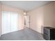 Simple bedroom with double door closet and wall-mounted wine cooler at 1551 Larimer St # 2805, Denver, CO 80202