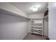 Large walk-in closet with shelving and hanging rods at 1551 Larimer St # 2805, Denver, CO 80202