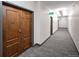 Building hallway with carpet and doors to units at 1551 Larimer St # 2805, Denver, CO 80202