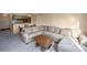 Living room with sectional sofa and coffee table at 1551 Larimer St # 2805, Denver, CO 80202