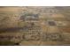 Wide aerial view of a Primary-planned community featuring homes, open spaces, and well-defined street grids at 48250 Shetland Dr, Bennett, CO 80102