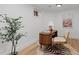 Charming basement office with mid-century modern desk and zebra print rug at 817 29Th St, Denver, CO 80205