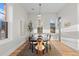 Bright dining room with hardwood floors and a modern dining table at 817 29Th St, Denver, CO 80205