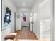 Bright and airy entryway with hardwood floors and access to other rooms at 817 29Th St, Denver, CO 80205