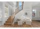 Elegant wooden staircase leading to the upper level of the home at 817 29Th St, Denver, CO 80205