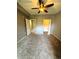 Bedroom with ceiling fan and carpet flooring at 17443 Nature Walk Trail # 102, Parker, CO 80134