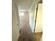 Hallway with carpeted floors and doors to bedrooms at 17443 Nature Walk Trail # 102, Parker, CO 80134