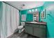 Stylish bathroom featuring a shower and vanity with great lighting at 12931 Ironstone Way # 303, Parker, CO 80134