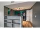 Well-designed kitchen with dark cabinets and modern appliances, complemented by sleek countertops and stylish flooring at 12931 Ironstone Way # 303, Parker, CO 80134