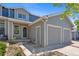 Inviting home with a two-car garage, featuring neutral siding and well-maintained landscaping at 11050 Gaylord St, Northglenn, CO 80233