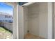 Bright laundry room with shelving provides convenient in-home laundry with access to backyard at 11050 Gaylord St, Northglenn, CO 80233