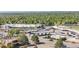 Busy commercial area with gas station, variety of shops, ample parking and tree lined streets at 4381 Dixon Dr, Westminster, CO 80031